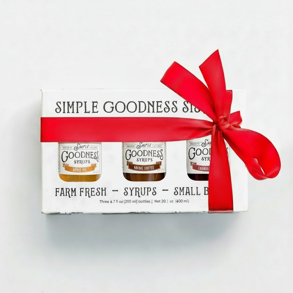 A cocktail syrup sampler kit with coffee, cranberry and apple flavors